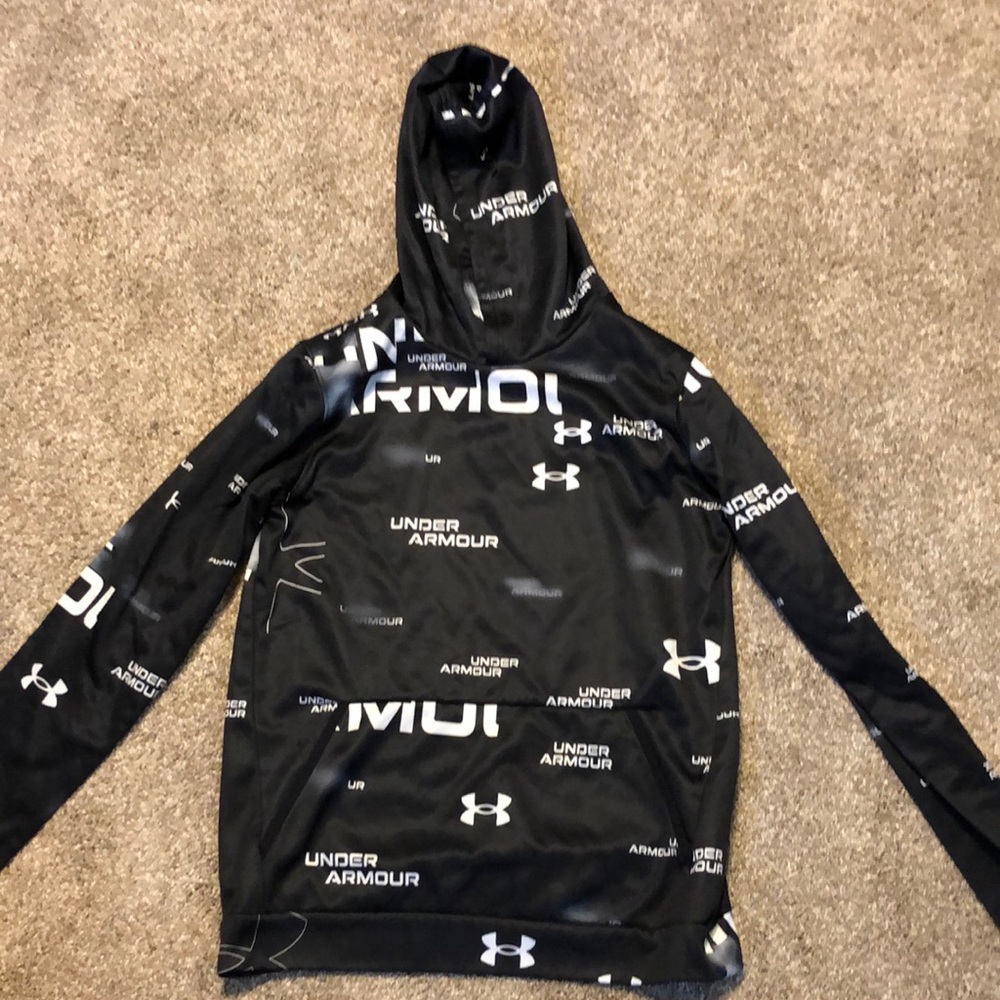 A black and white under armor YOUTH EXTRA LARGE